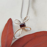 Garnet Open Loop Cross Pendant